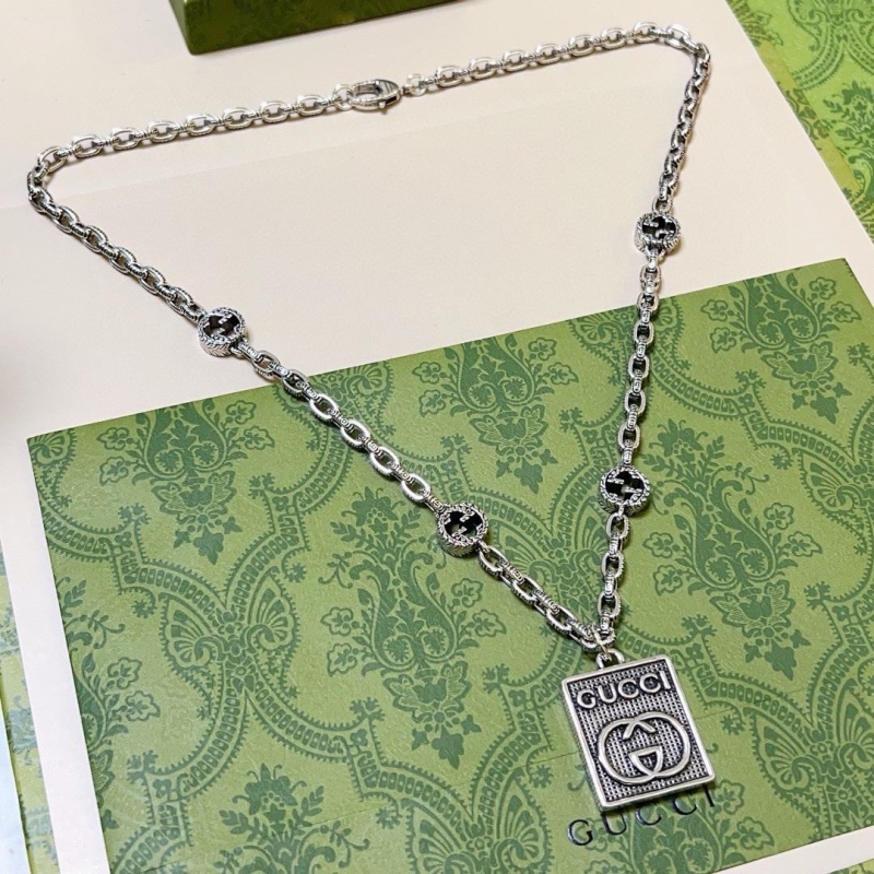 G*u*i necklaces